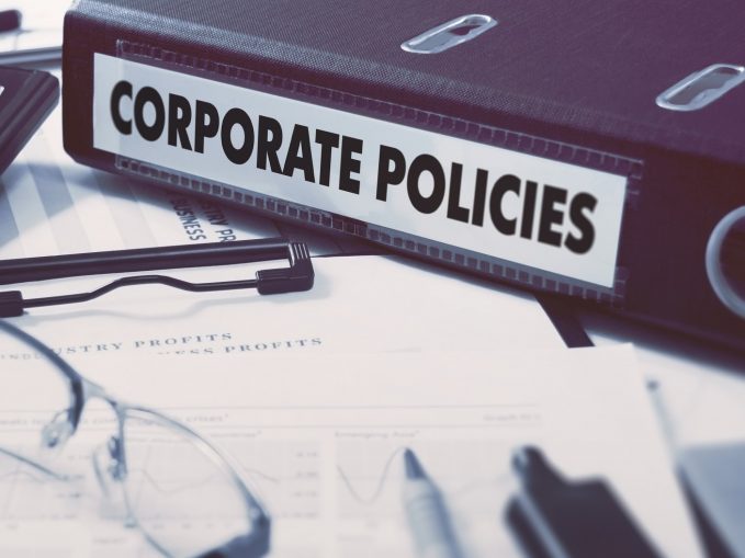 Corporate Policies on Office Folder. Toned Image.