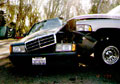 Dodge  pickup's bumper w/ oversize wheels hit Mercedes sedan's driver in the head (Escondido PD)