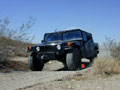 U.S. Army Hummer equipped with  MagnetoRheological fluid Optimized Active Damper Suspension (MROADS)